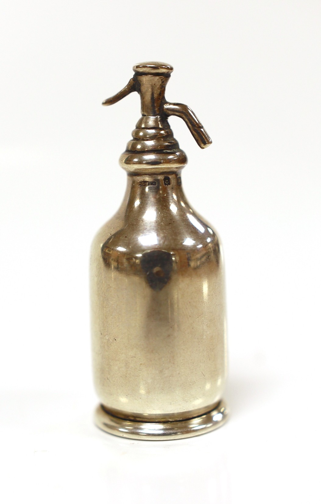 An Edwardian miniature silver model of a soda syphon, Saunders & Shepherd, Birmingham, 1906, 62mm.